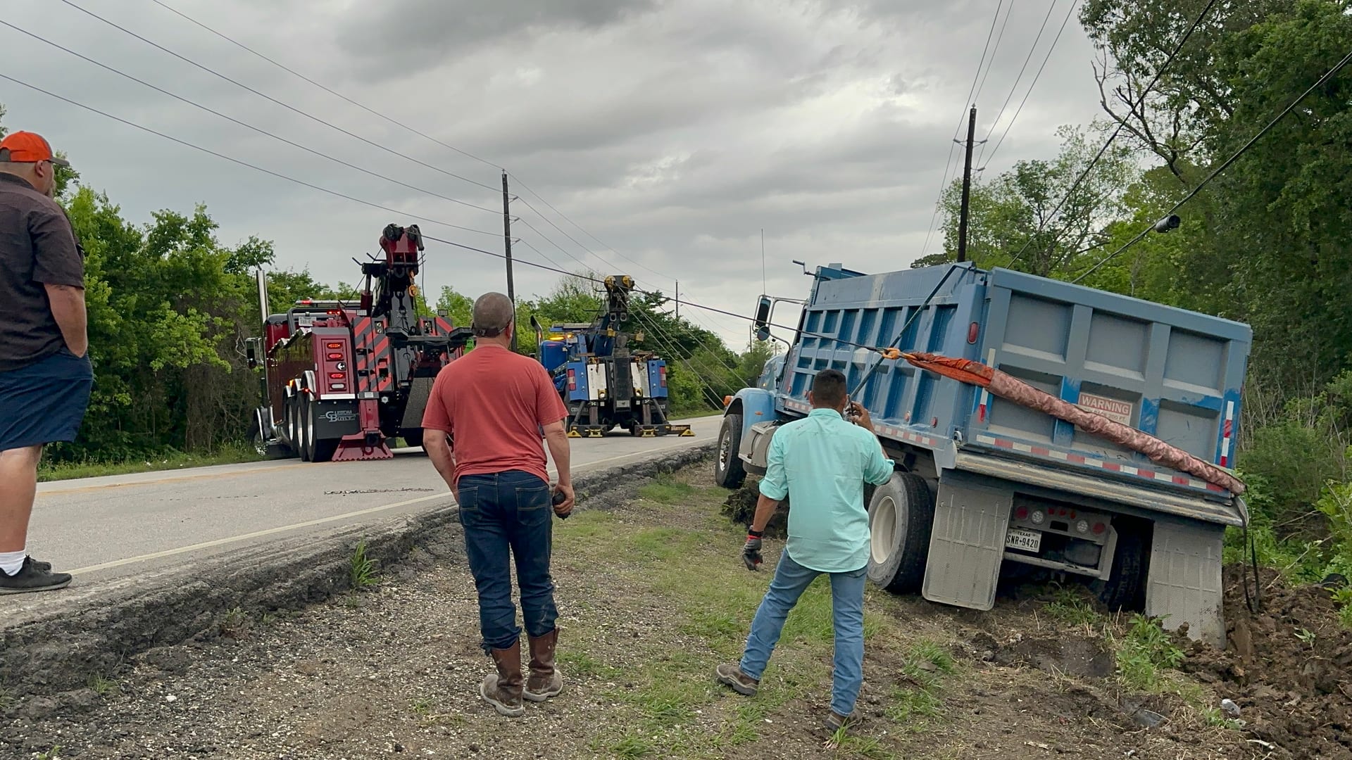 Dump trailer being winched - trailer repair service