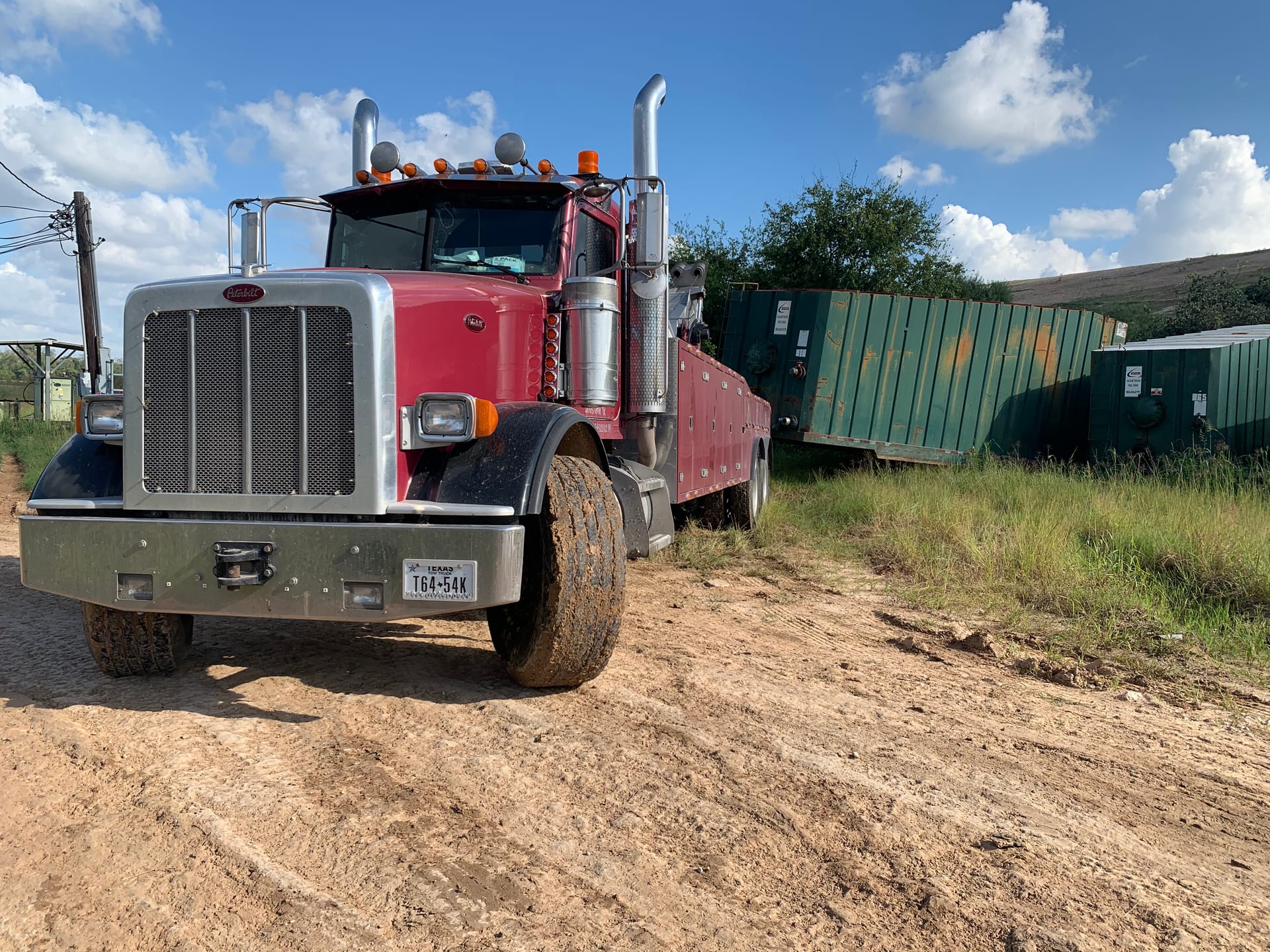Peterbilt rotator at an industrial container yard